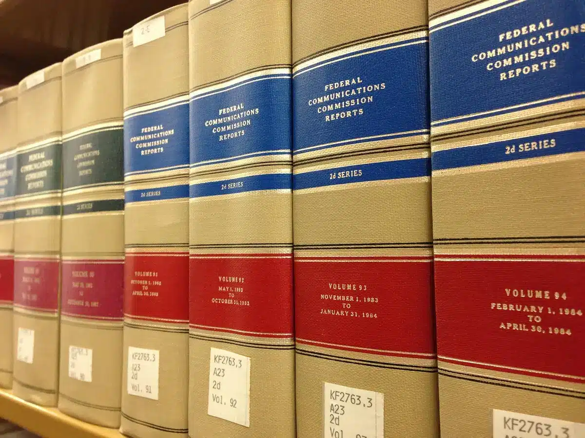 Researcher reviewing survey forms and data about charter schools