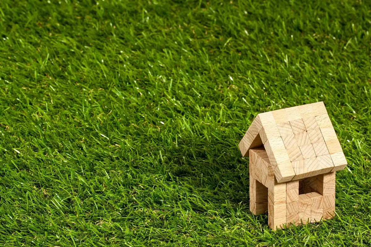 Household bills, calculator and mortgage papers on a table illustrating higher borrowing costs