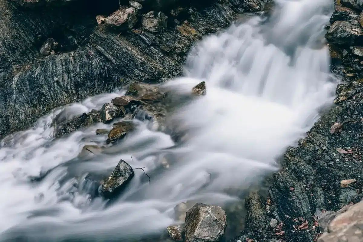 Smartphone showing a long vertical video ad for a show