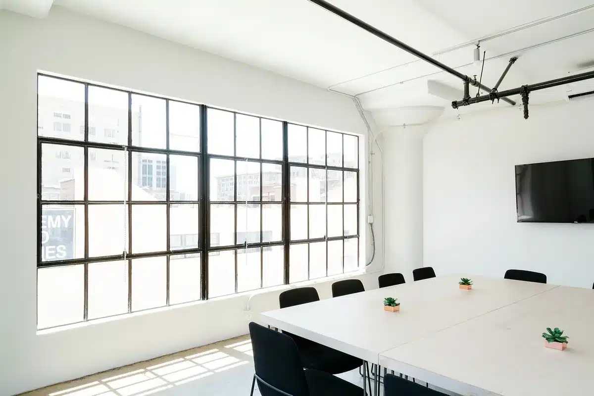 Anonymous meeting table with papers and a pen about research audits