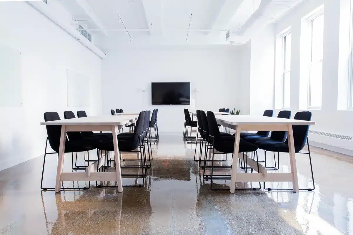 City officials reviewing venue plans around a meeting table