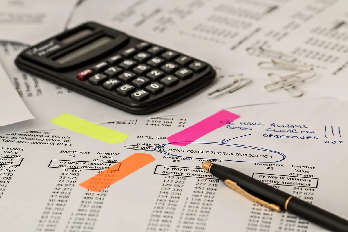 Printed chart showing tax revenue and numbers on a desk
